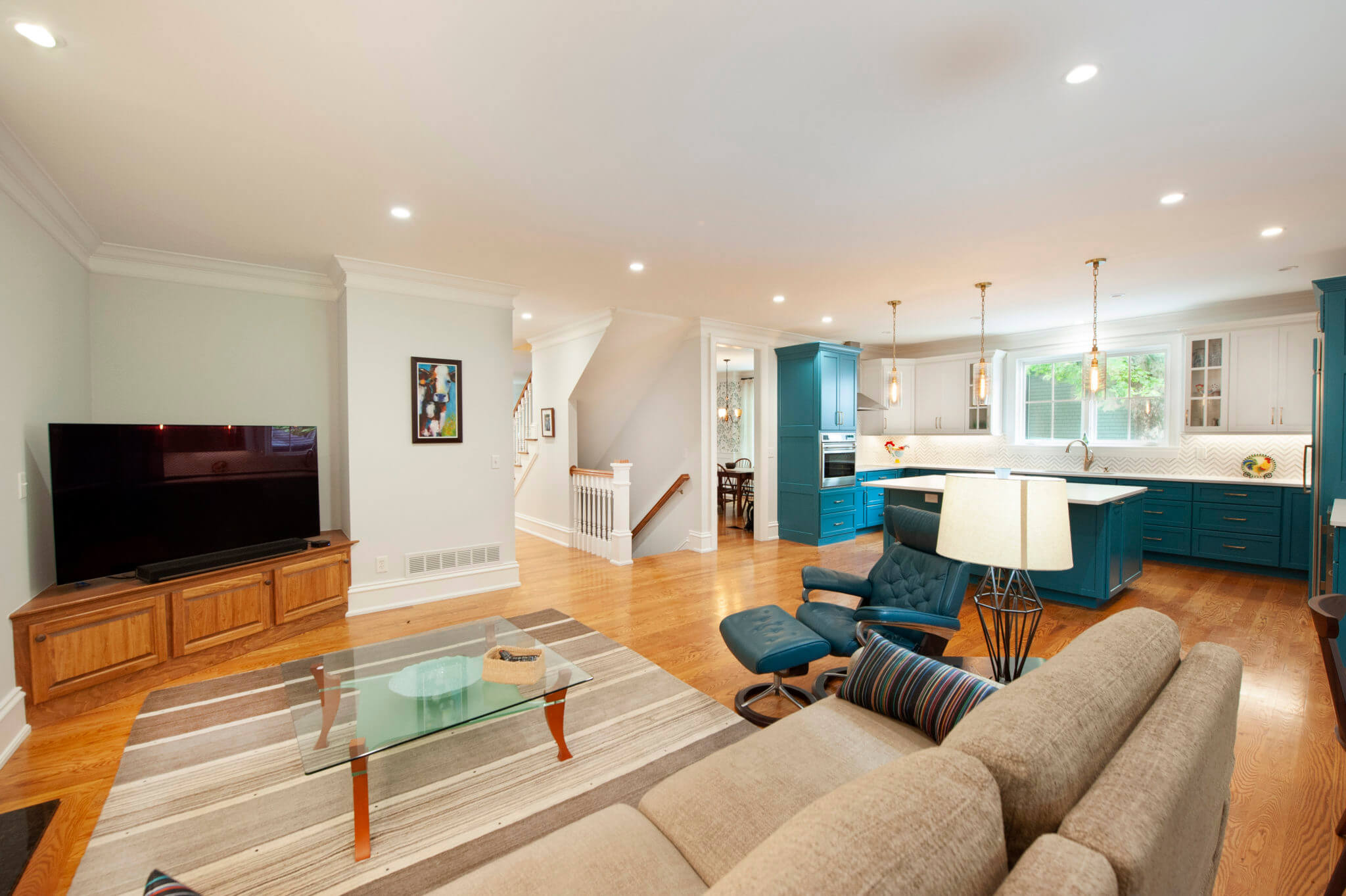 Open-concept living room and kitchen area.