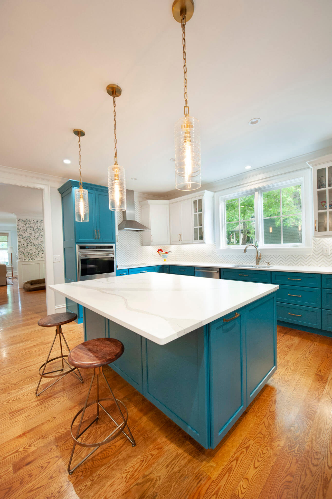 Modern kitchen with blue cabinets and island.