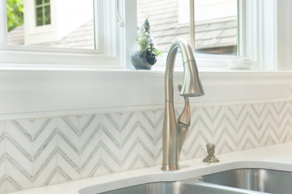 Modern kitchen sink with stylish faucet.