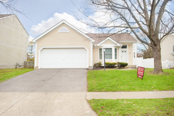 Single-story house with garage and driveway.