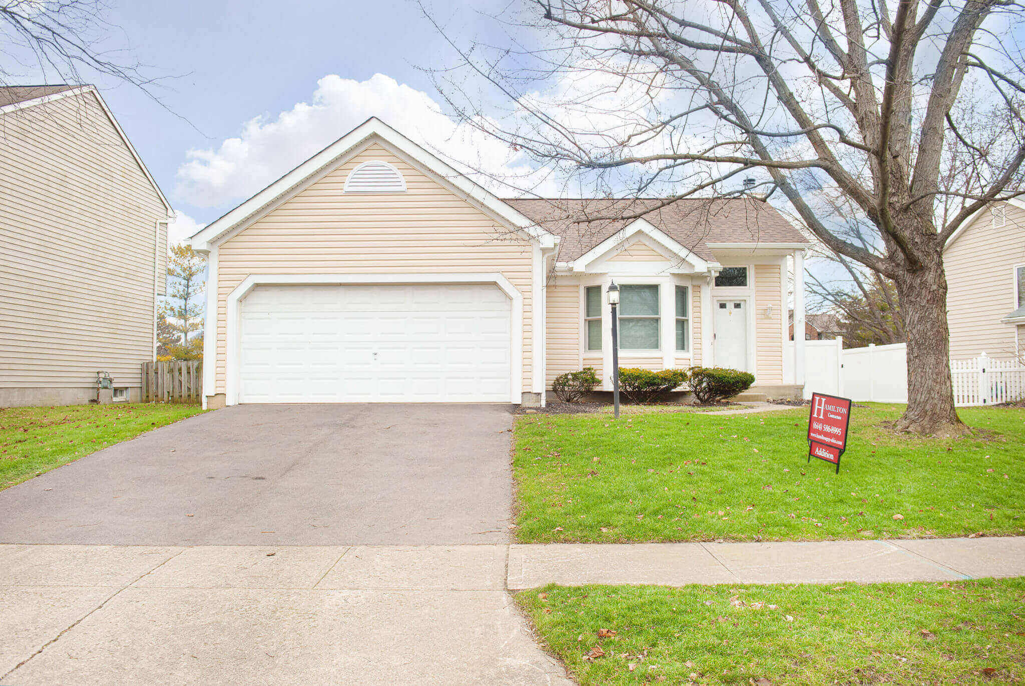 Single-story house with garage and driveway.